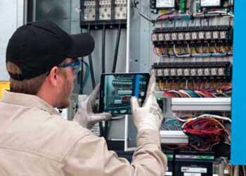 HVAC technician assessing an HVAC system